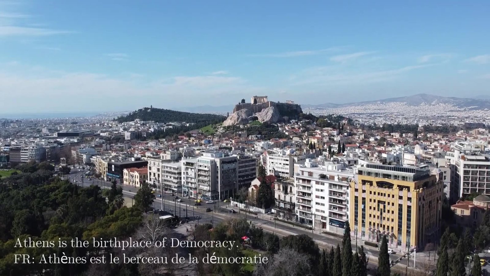 Athens city view with the Acropolis hill in the distance