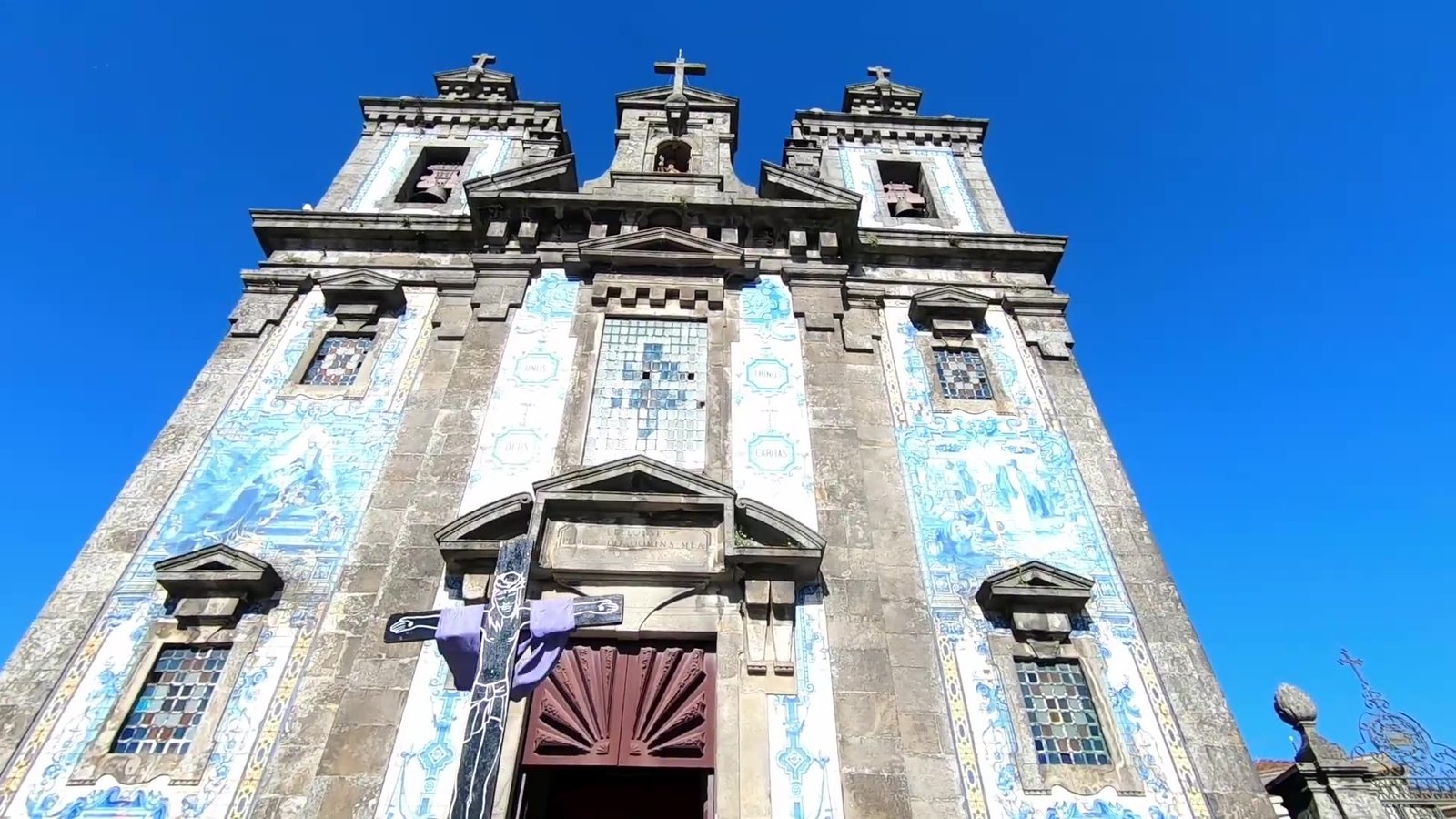Blue azulejo tiles on a church facade in Porto