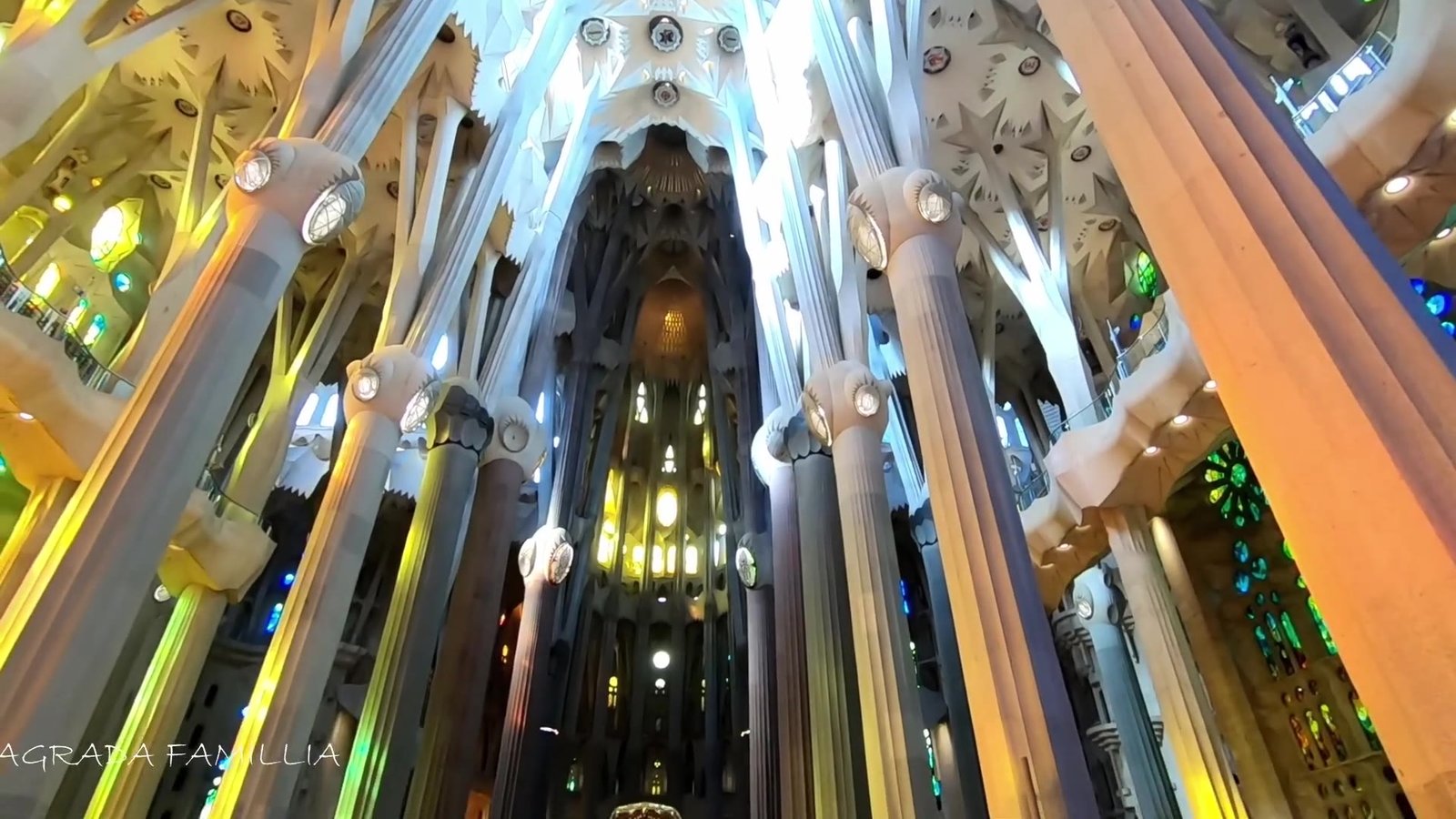 Inside the Sagrada Família in Barcelona with coloured light